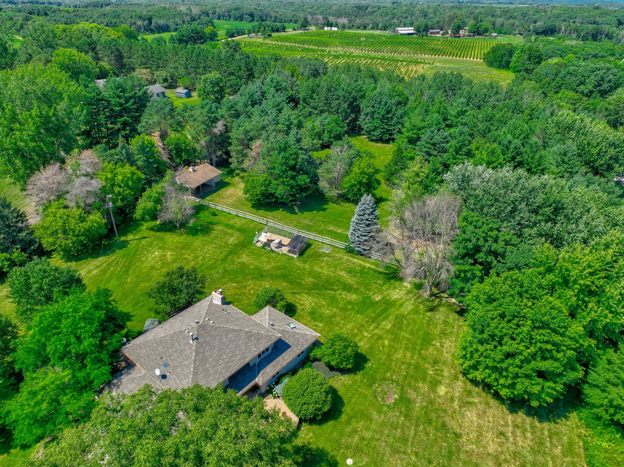 Enjoy an unparalleled hilltop setting with breathtaking vistas overlooking the St. Croix River Bluffs
