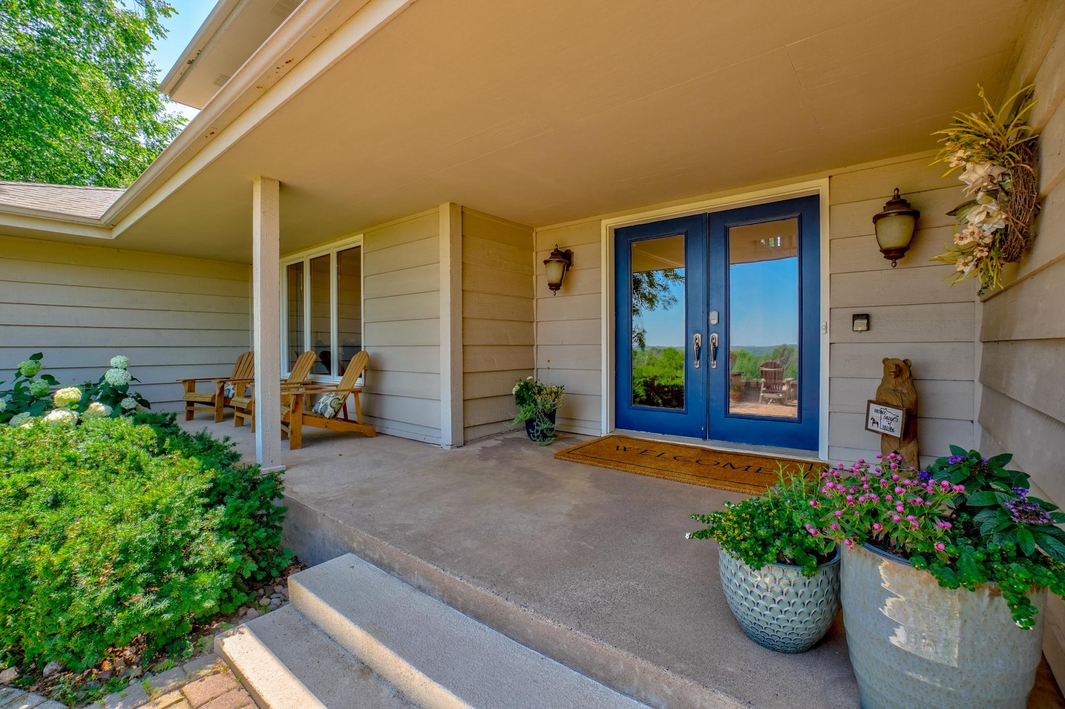 A welcoming front porch creates the perfect first impression and a peaceful place to enjoy the outdoors