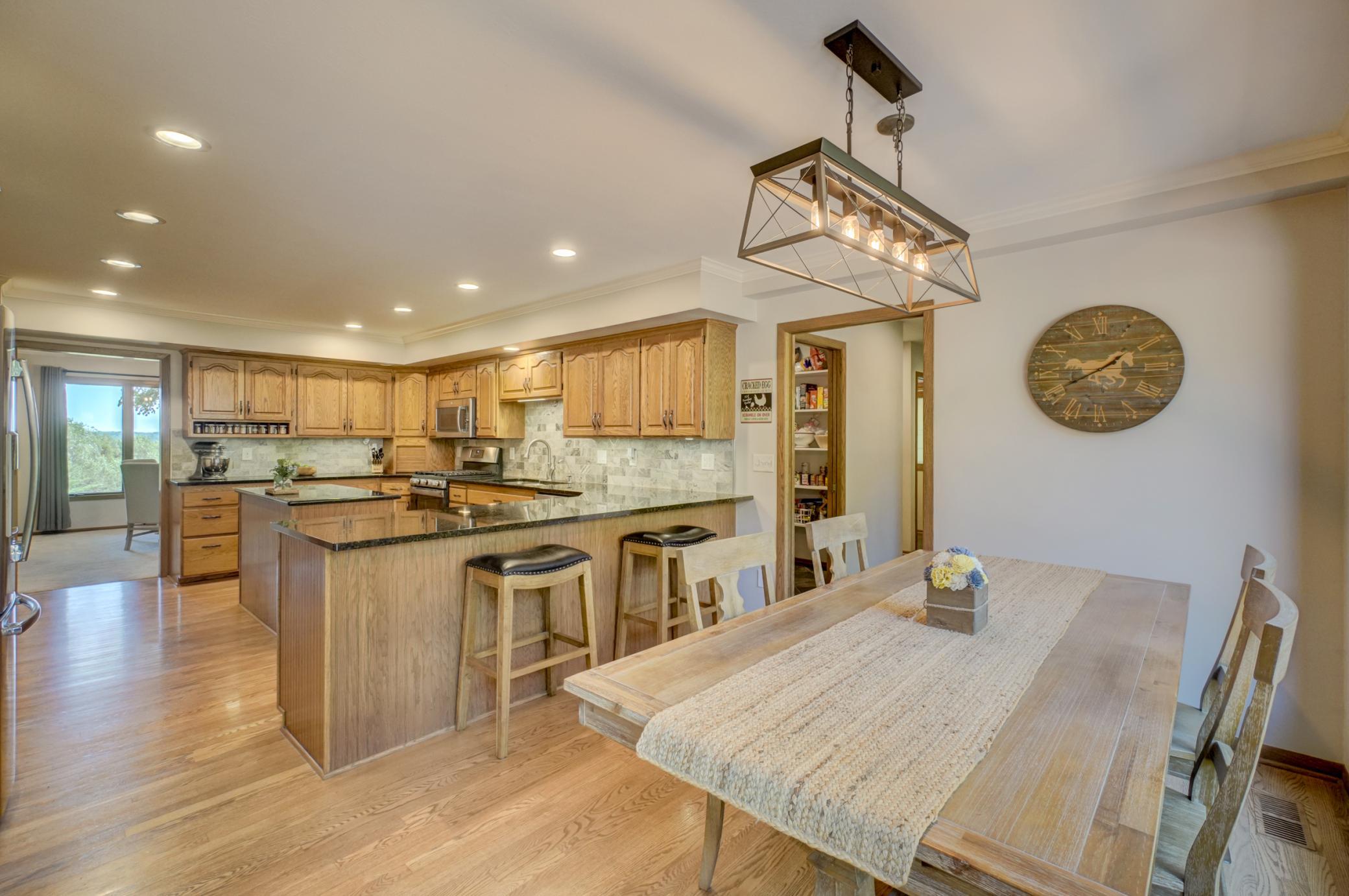 Located just off the kitchen, this spacious walk-in pantry keeps everything organized and within easy reach