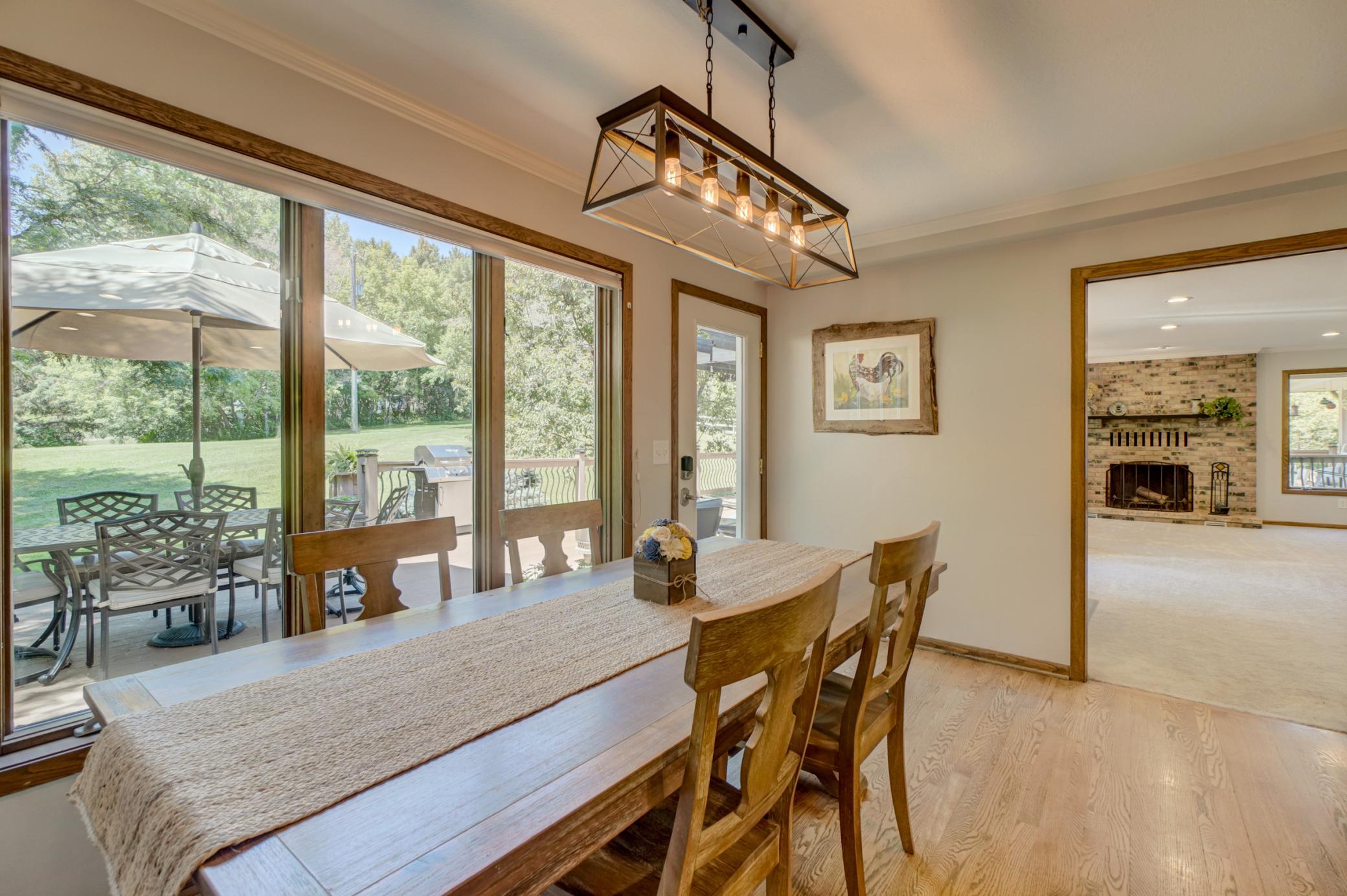 This informal dining area is the perfect place for everyday meals and offers convenient access to the expansive deck