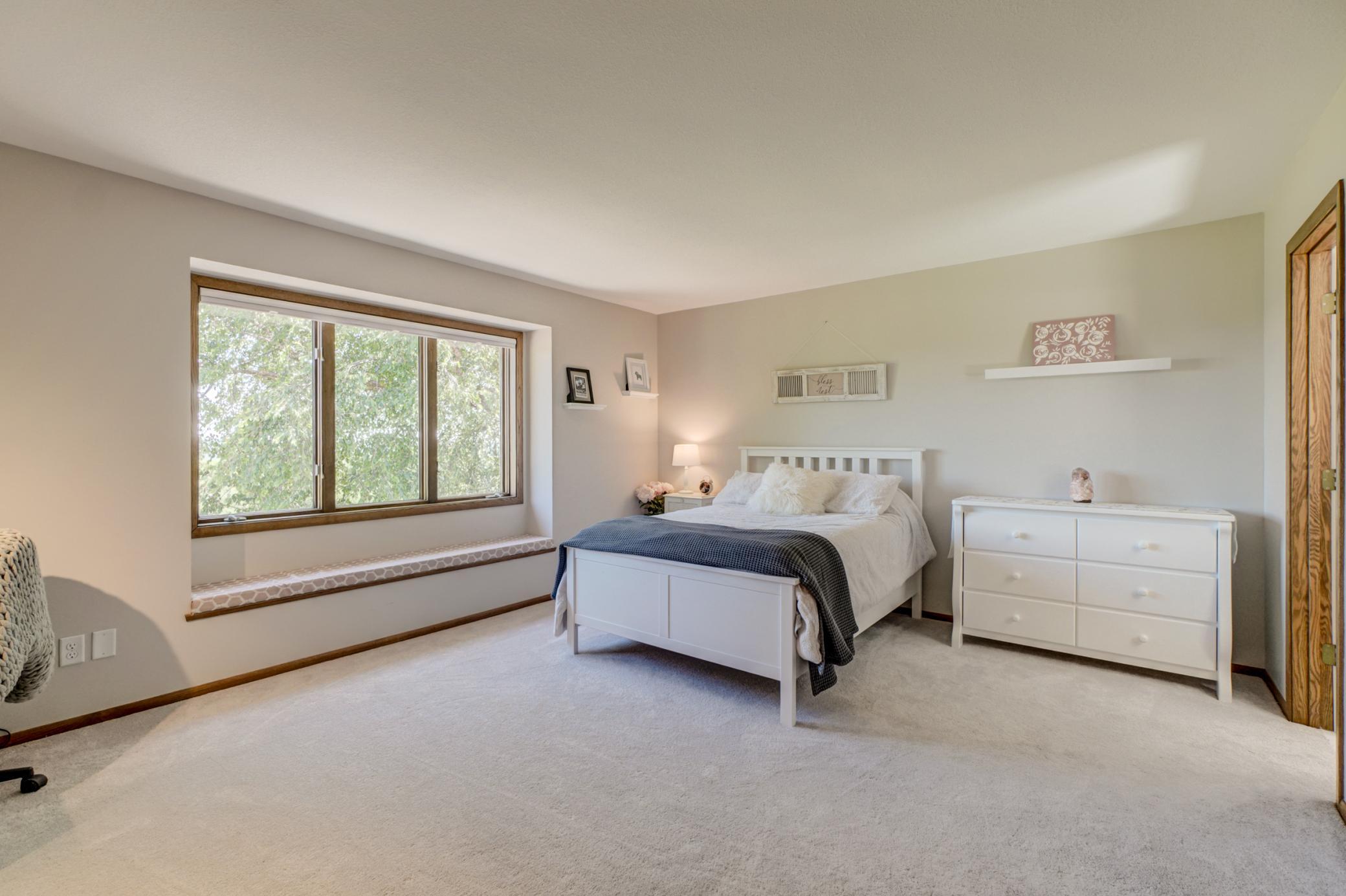 Take in the picturesque views from the inviting window seat in this second upper-level junior suite