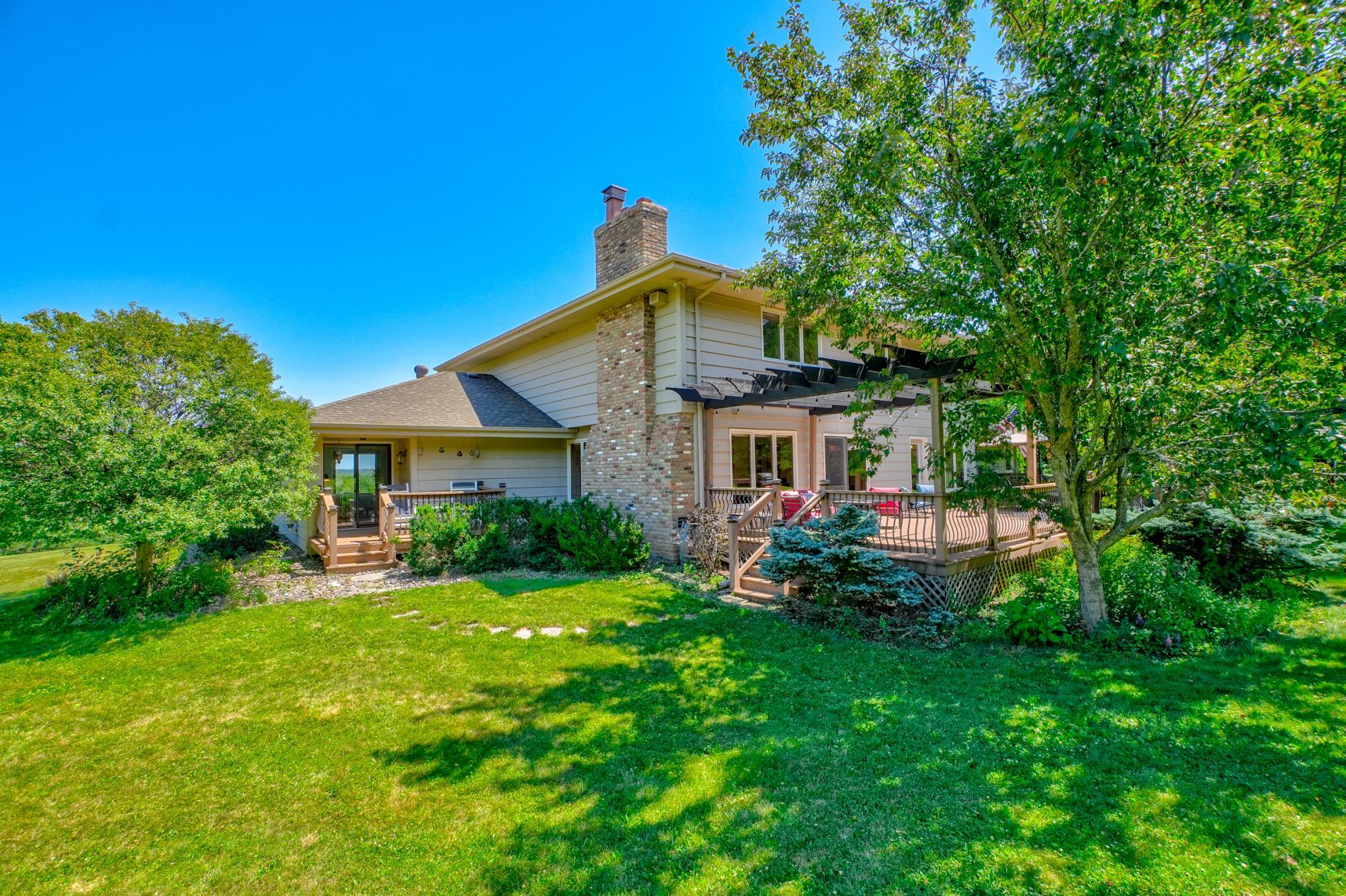 Whether from the private primary deck or the expansive back deck, you'll enjoy seamless access to the backyard