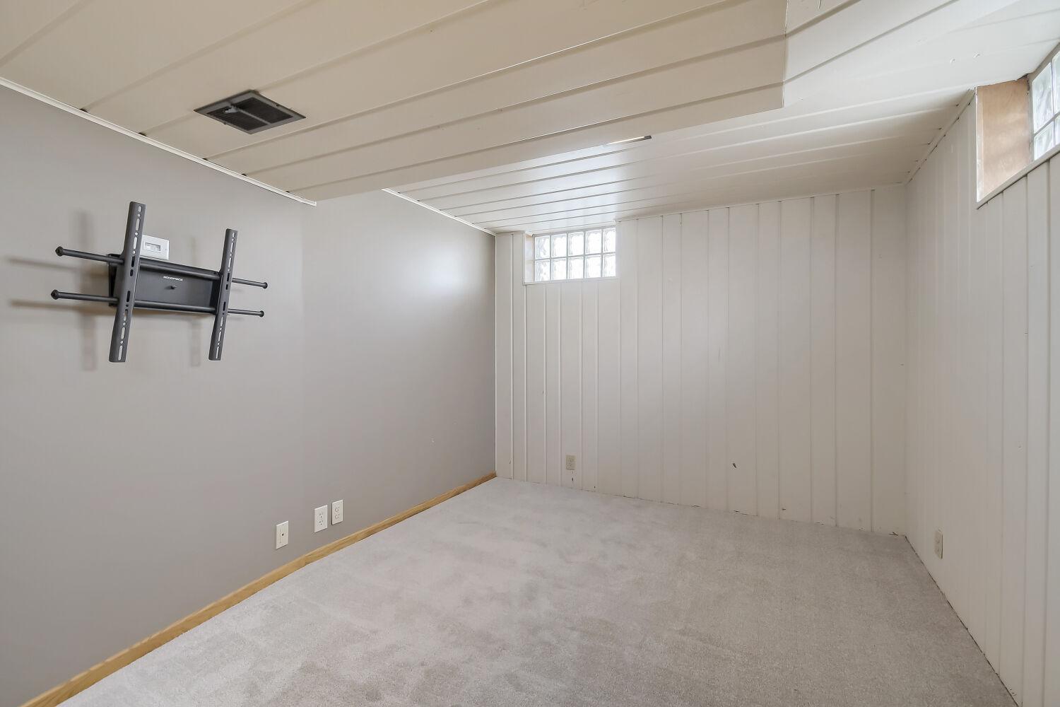 Add an egress window to the North side of the house for a 4th bedroom; instant equity!