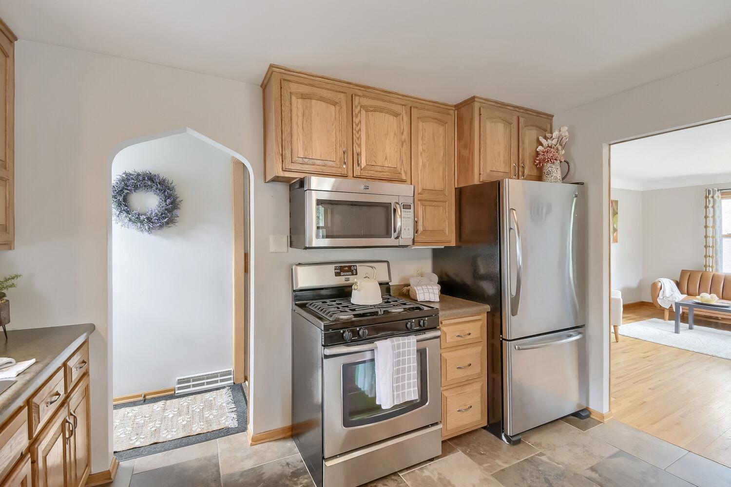 Stainless steel appliances and access right to your fenced backyard.