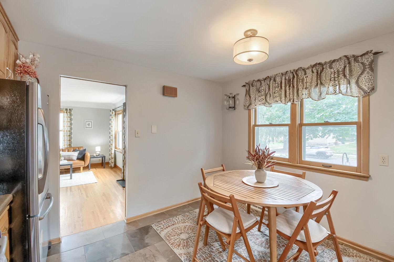 Eat-in-kitchen offers wall or buffet storage options.