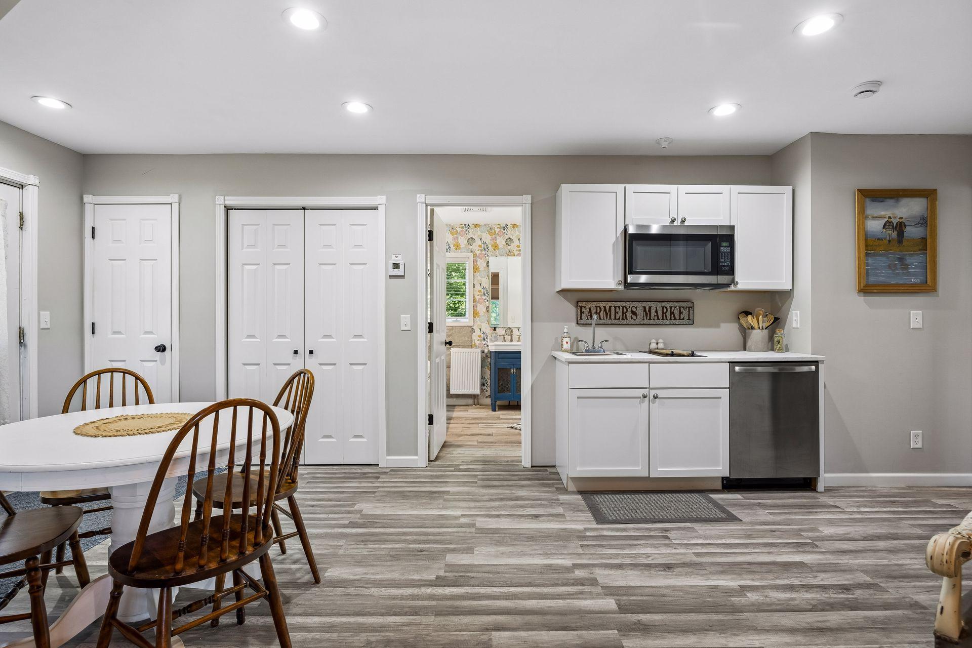 Kitchen and dining areas in the guest suite