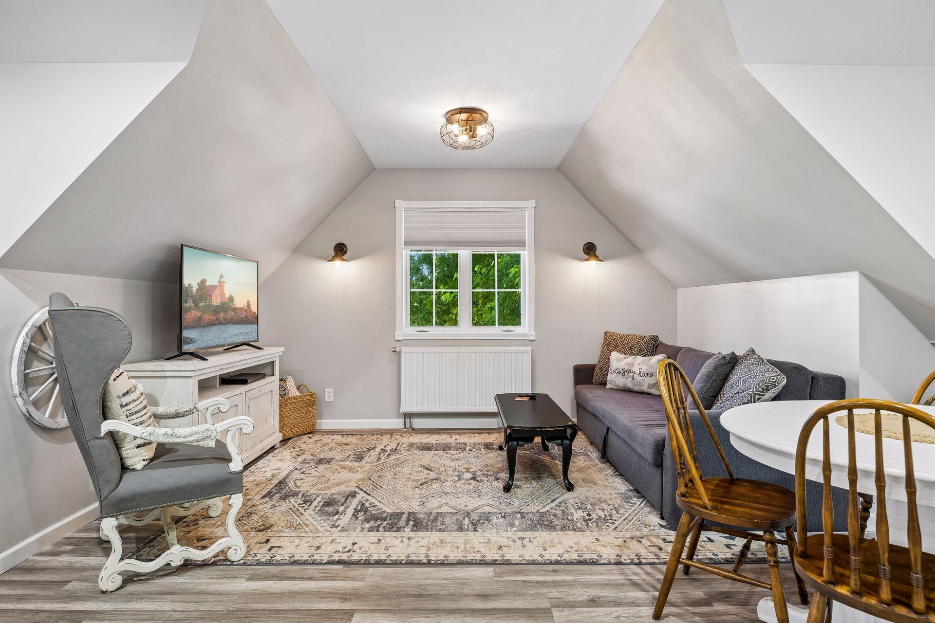 The guest suite above the detached garage has been used as a successful short-term rental since 2022, creating extra income.