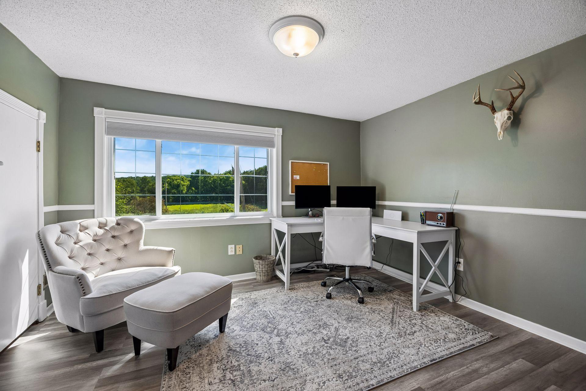 The 2nd upper level bedroom is currently being used as an office. Check out that view!