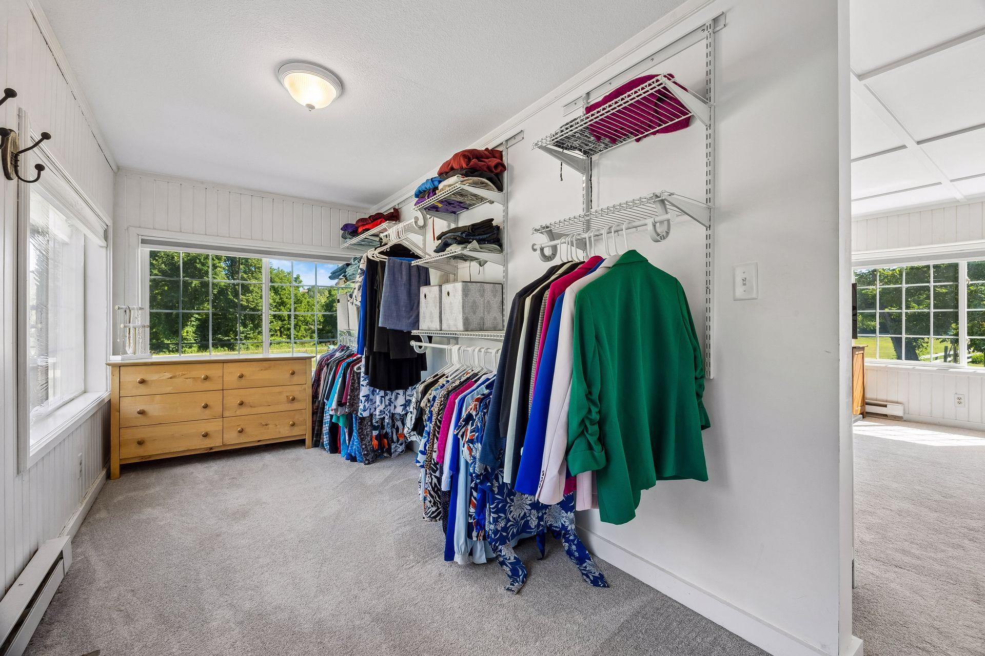 The main level's primary bedroom has an enormous walk-in closet