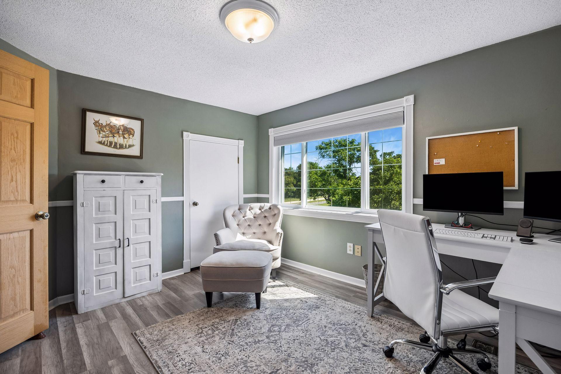 The 2nd upper level bedroom is currently being used as an office. Check out that view!