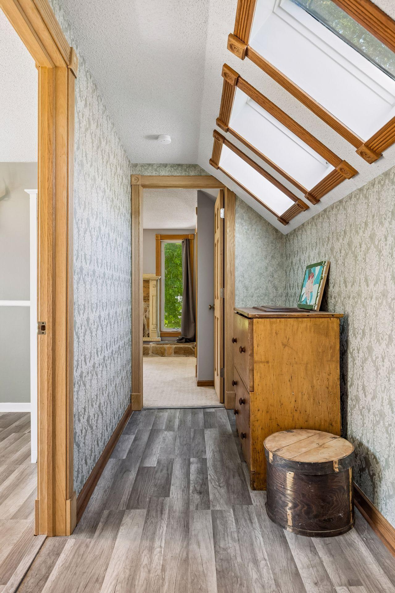The upstairs hallway leads you to 3 more bedrooms