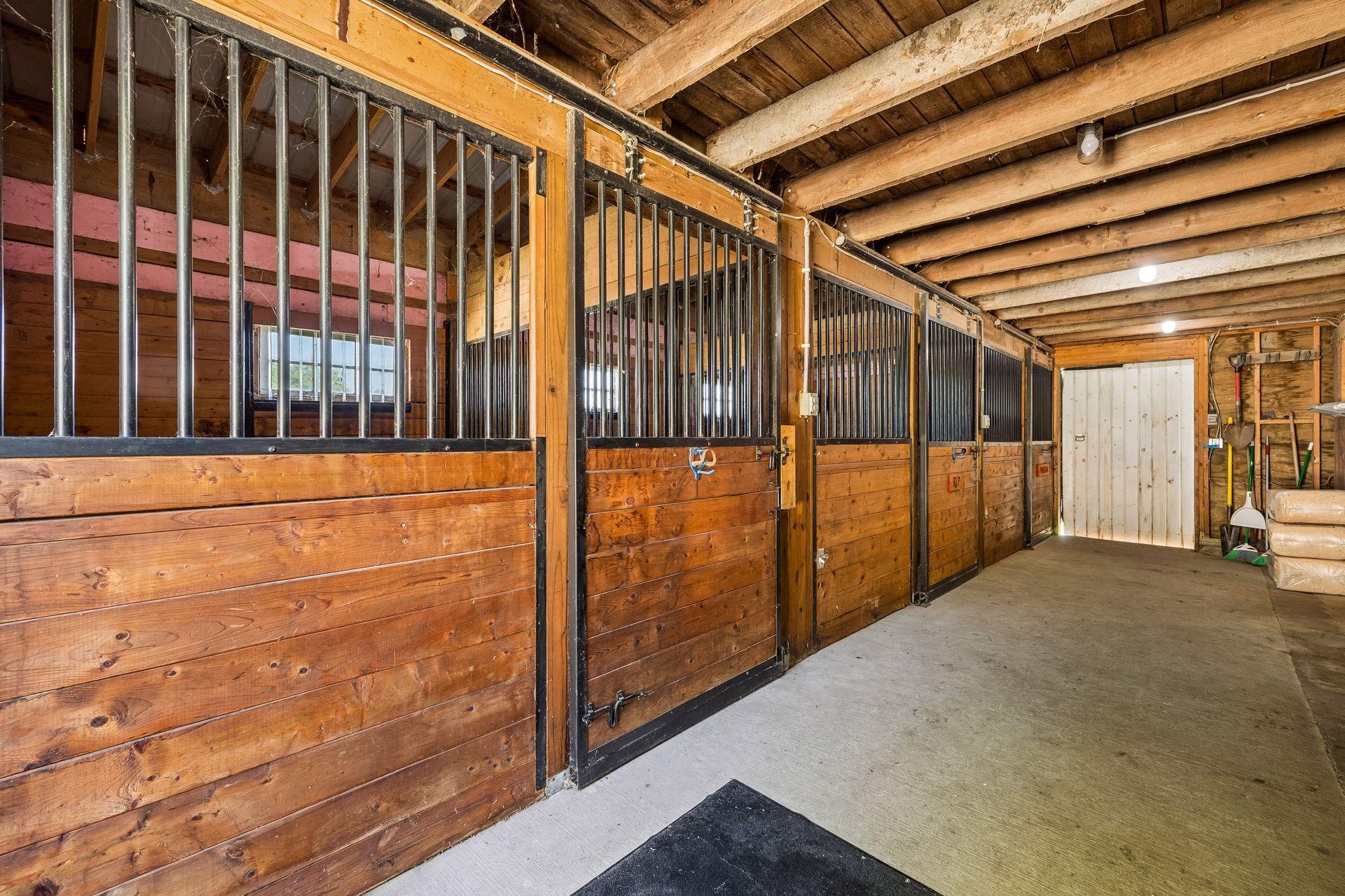 There are 3 oversized stalls plus a walk-in stall