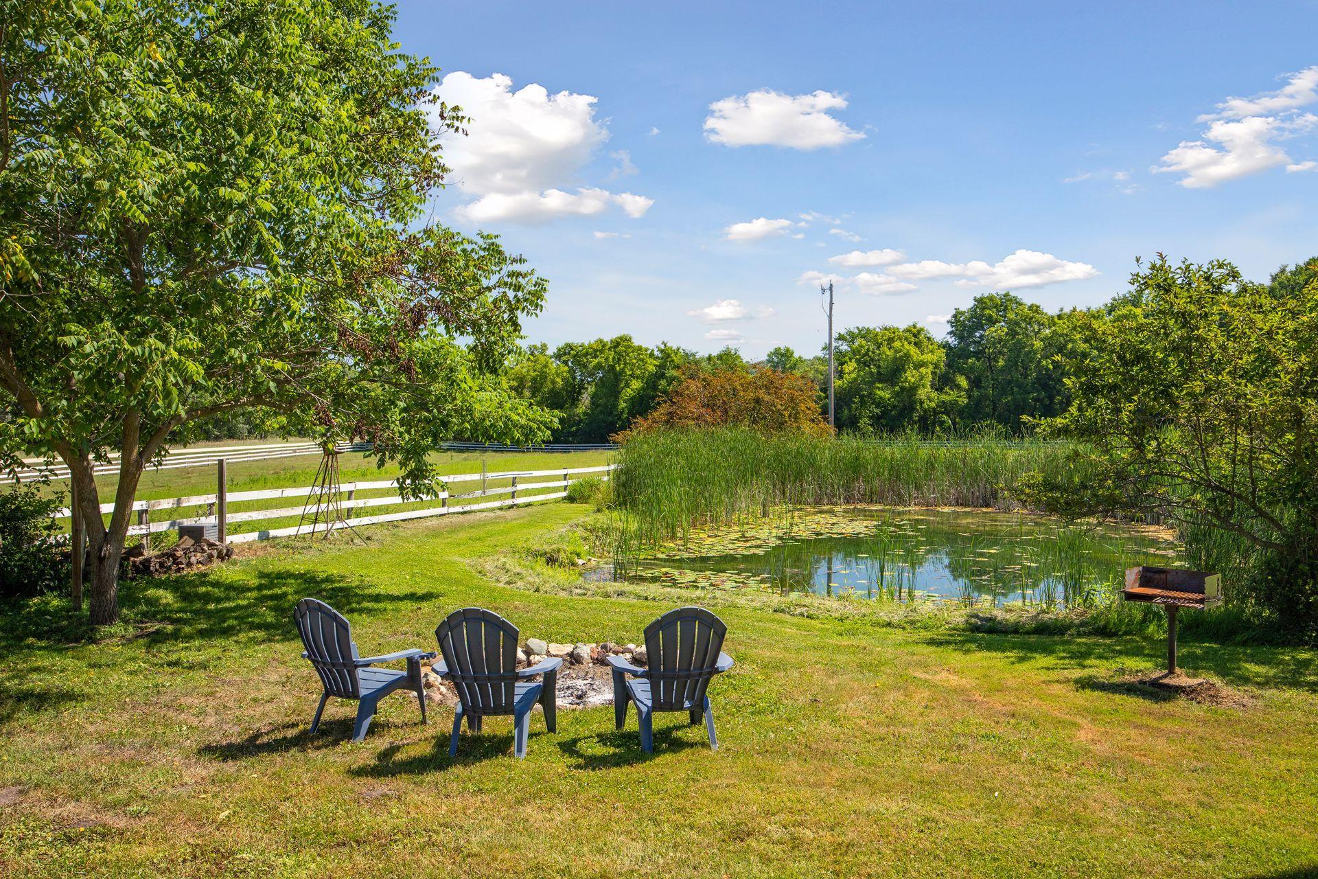 Enjoy the beauty of the pond. It's fed by an artesian well, so the water won't freeze in the winter.