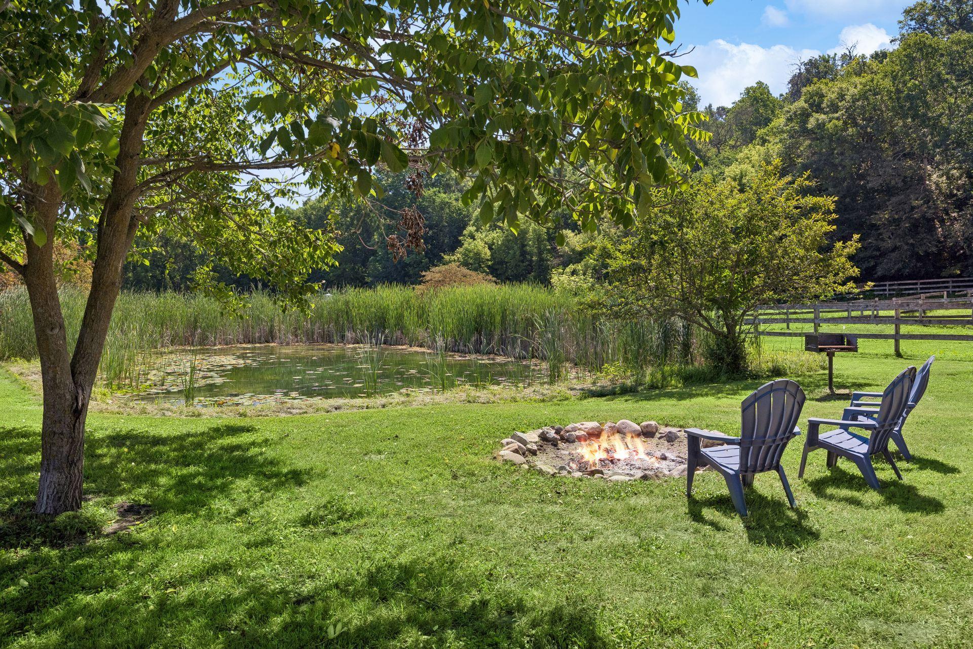 Relax and enjoy the fire pit, right by the pond