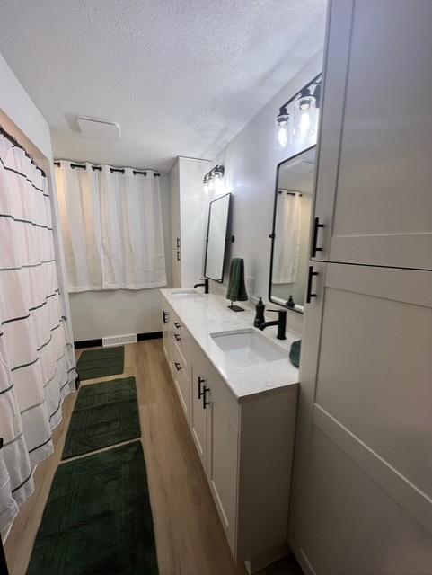 New Tub, Double Sinks and flooring in Main Level Bath.jpg
