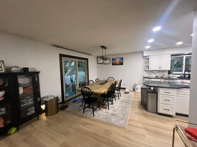 Main level walks out to large deck with amazing lake views