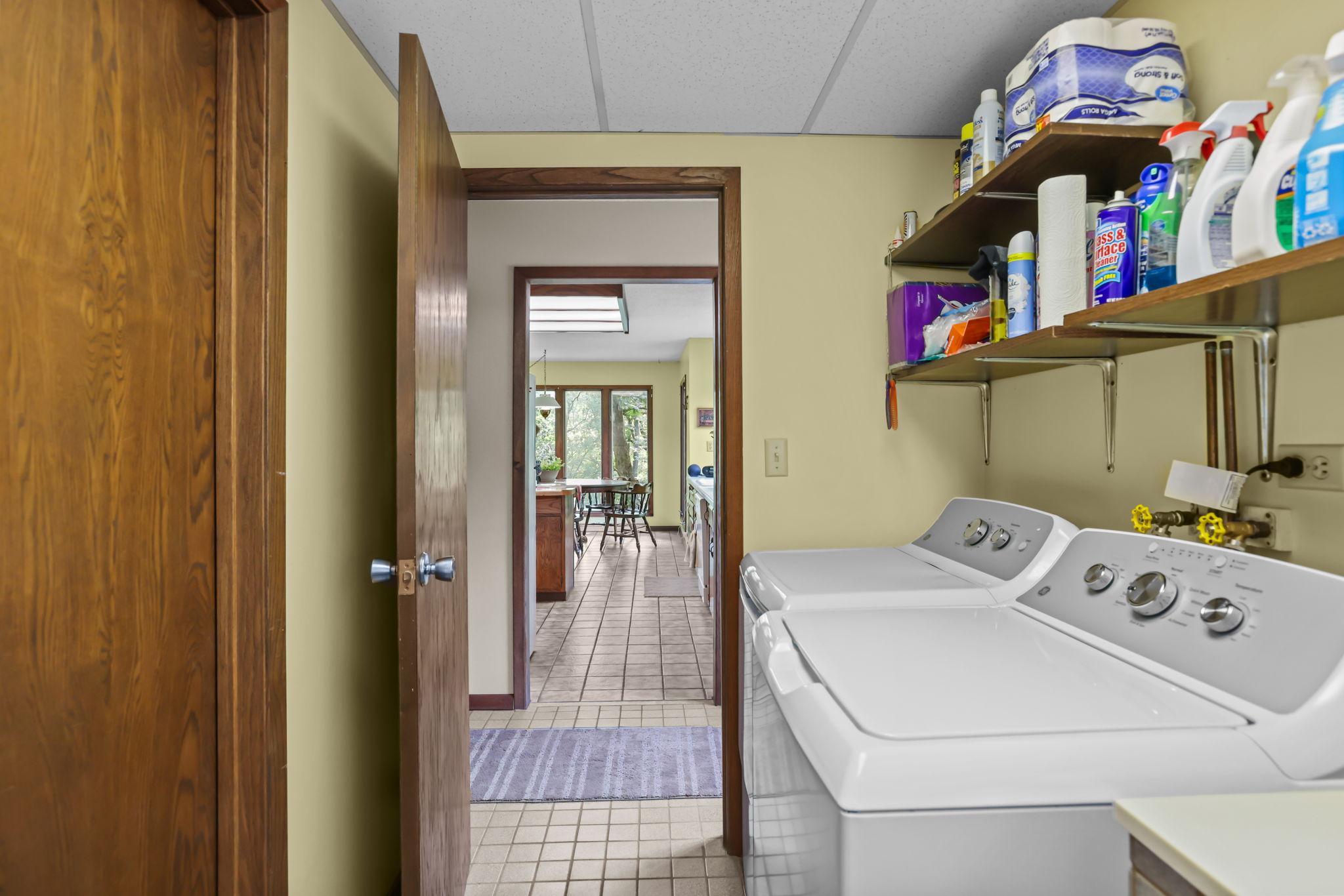 Main floor laundry offers convenience in a central location.