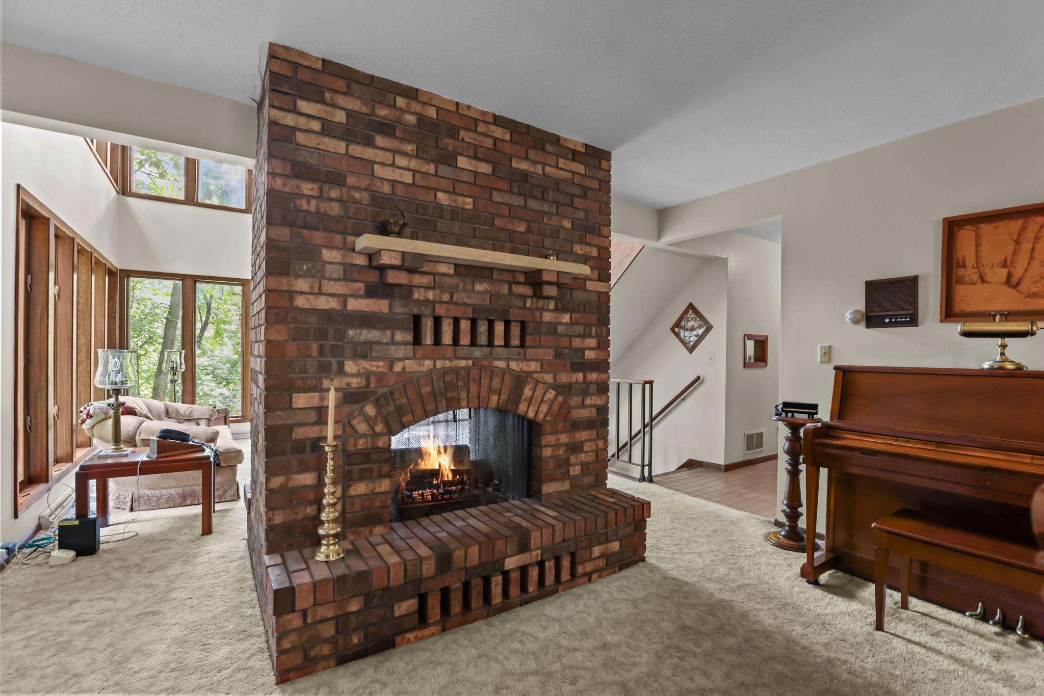 2-sided fireplace on the main level.