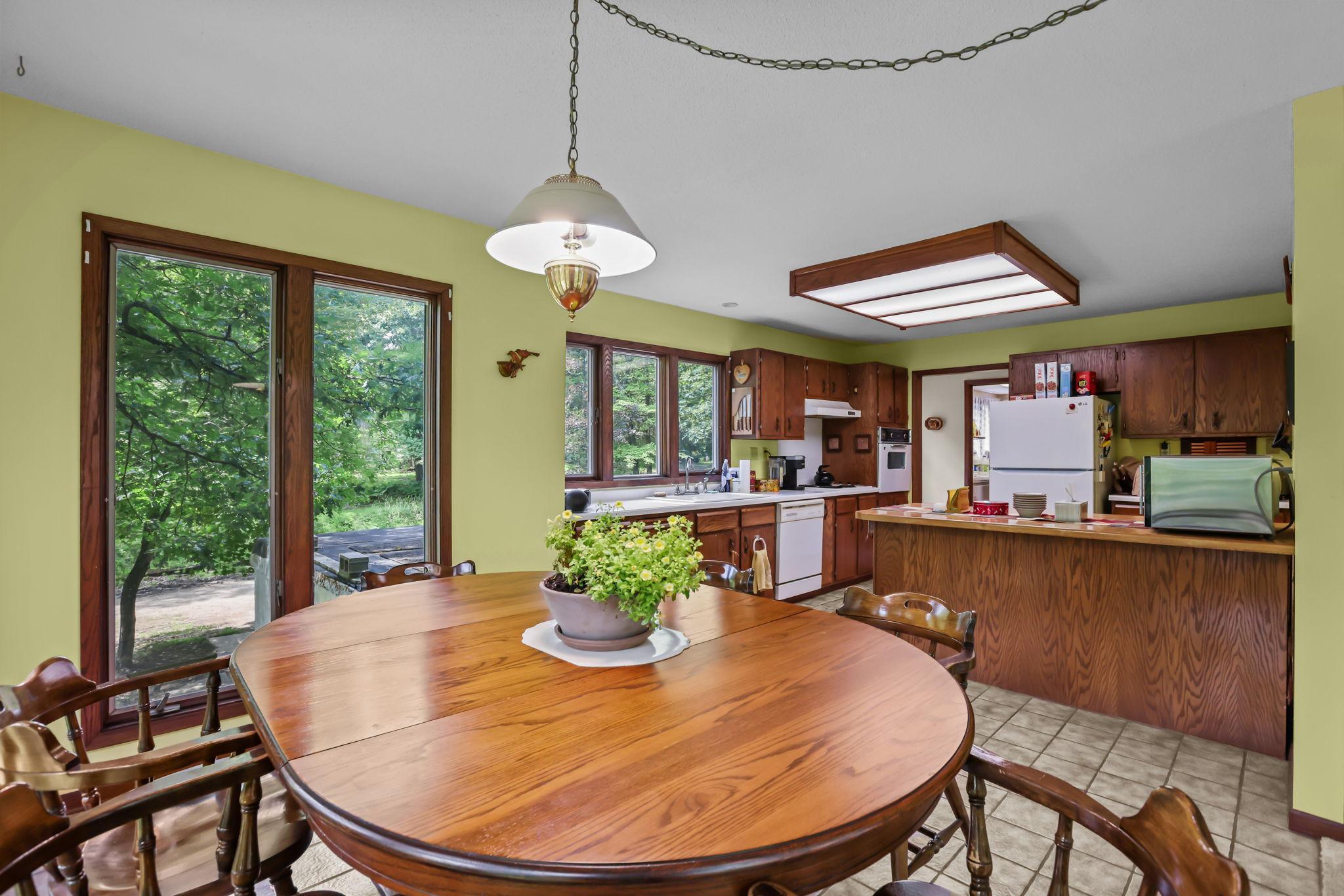 Breakfast area flows into the kitchen.