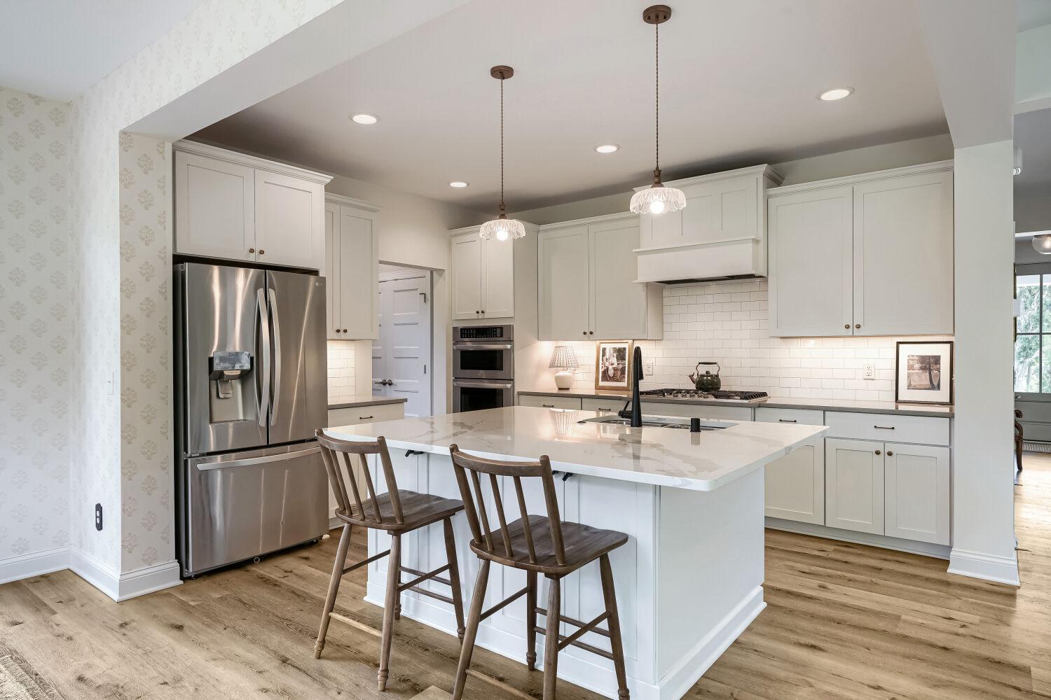 Chef's kitchen with large center island.