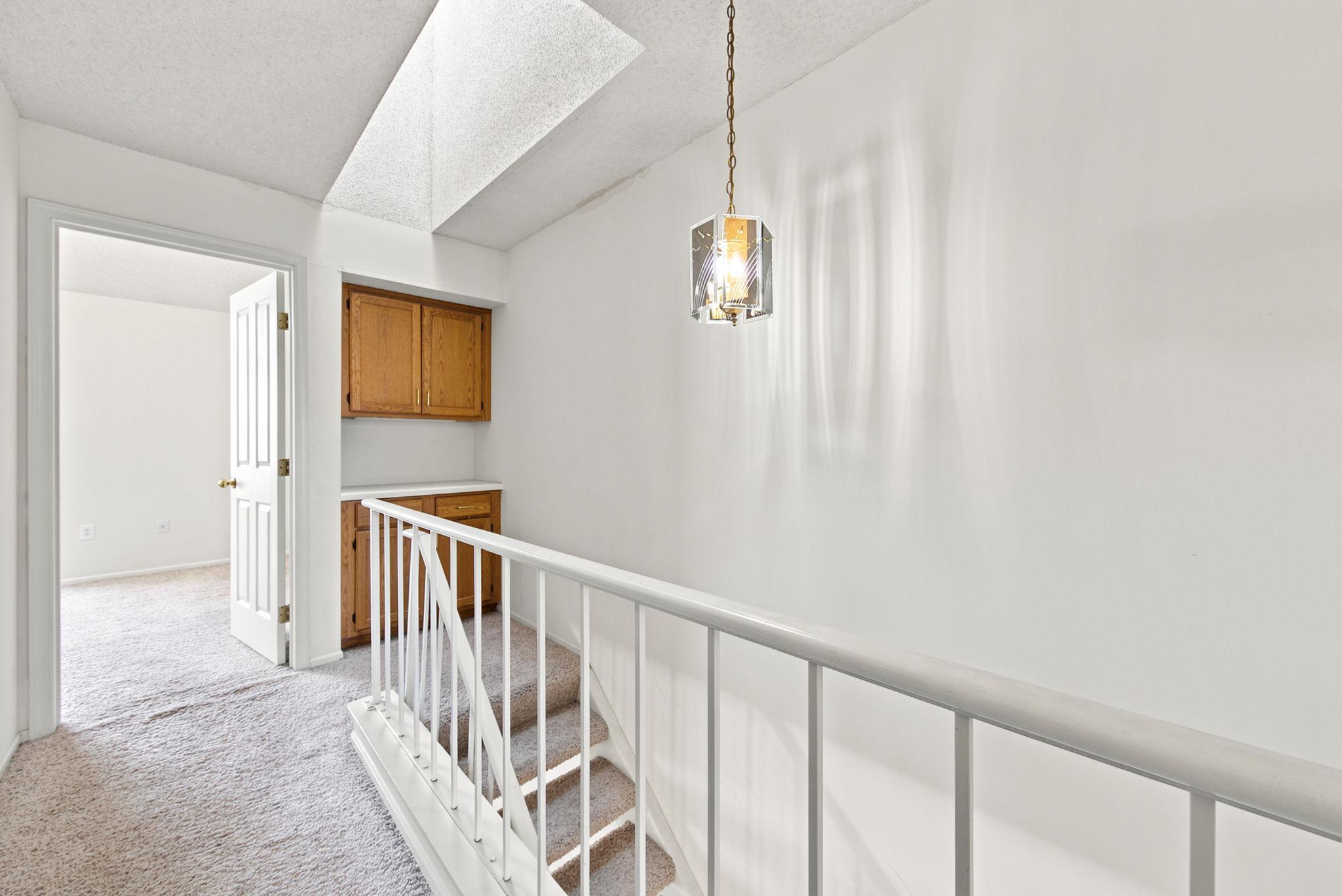 2 cabinets at the top of the landing