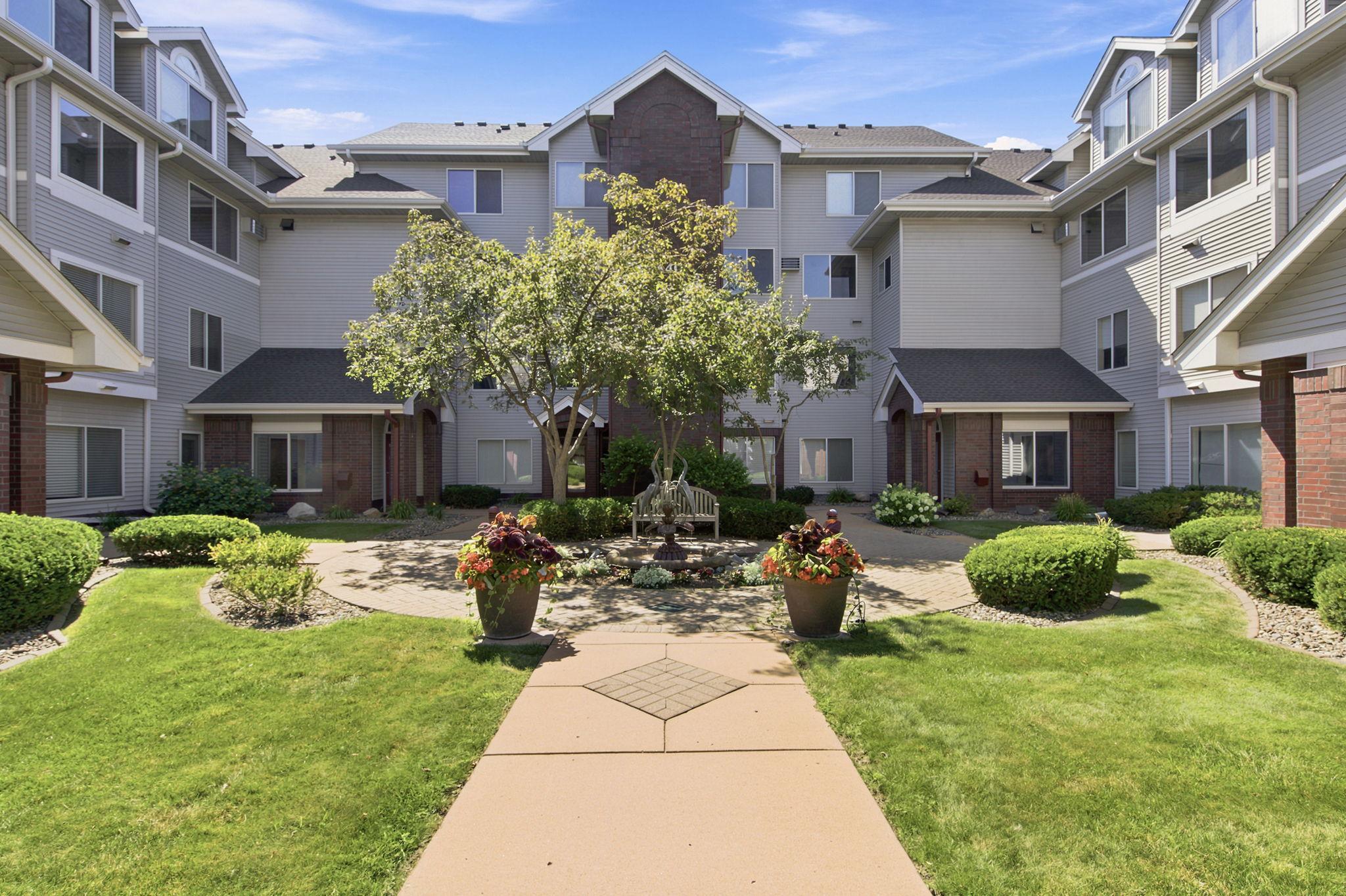 Beautiful courtyard and fountain in front of 7440