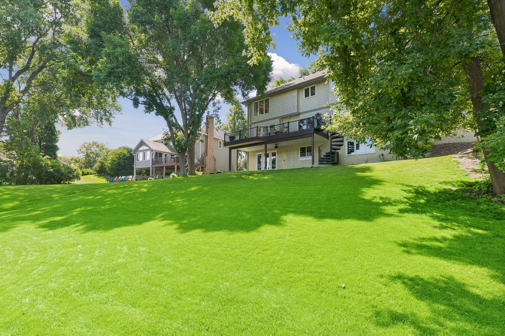 Gorgeous 1/2 acre gentle slope to lake