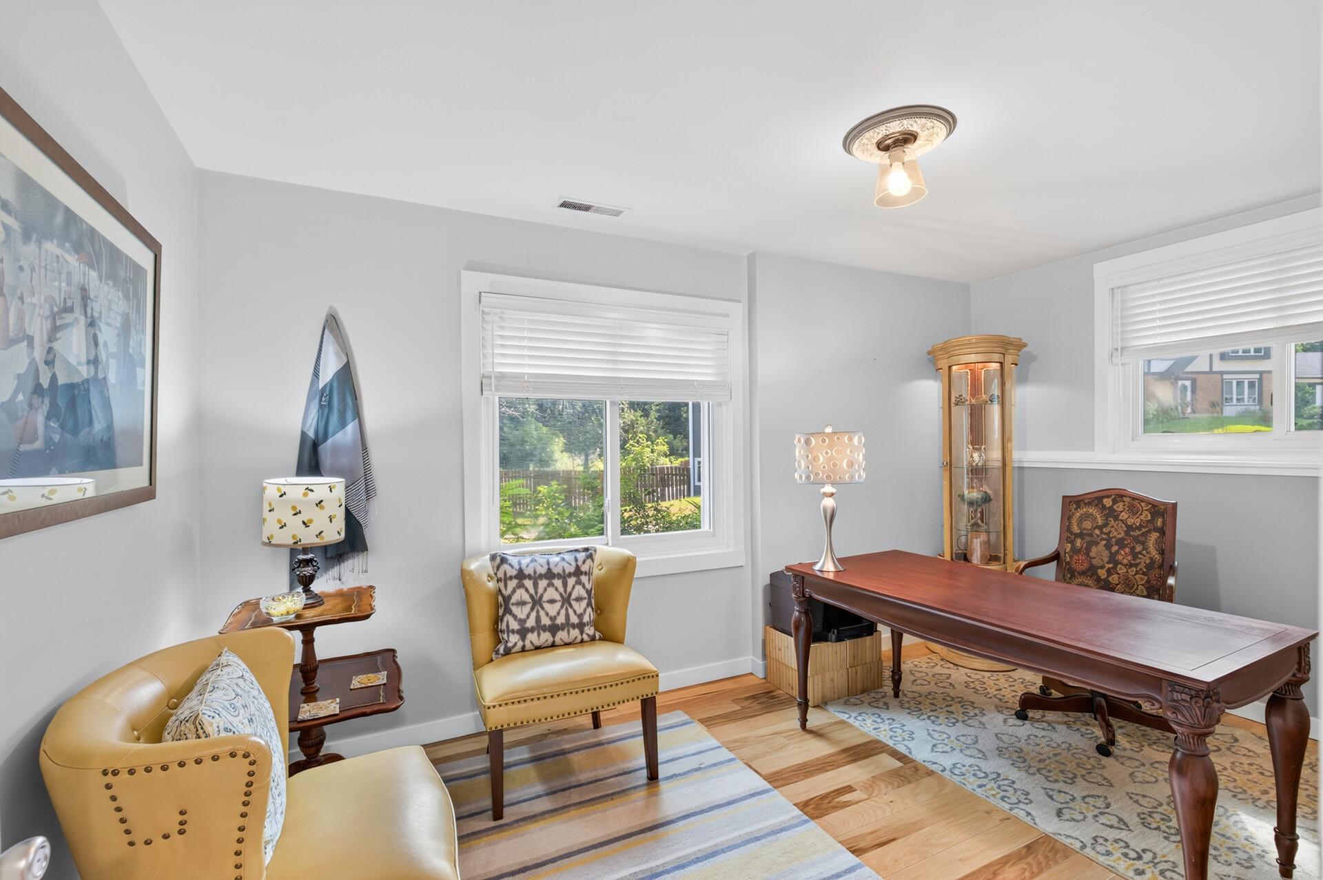 Versatile third-level room (or 4th bedroom) ready to serve as a bedroom, office, hobby room, or guest space.