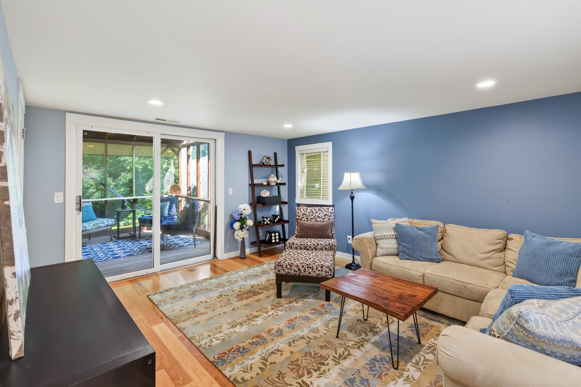 Flexible third-level living space offers another comfortable place to relax, work, or gather. It opens to a 3 season porch creating a separate entrance for a generational living option.