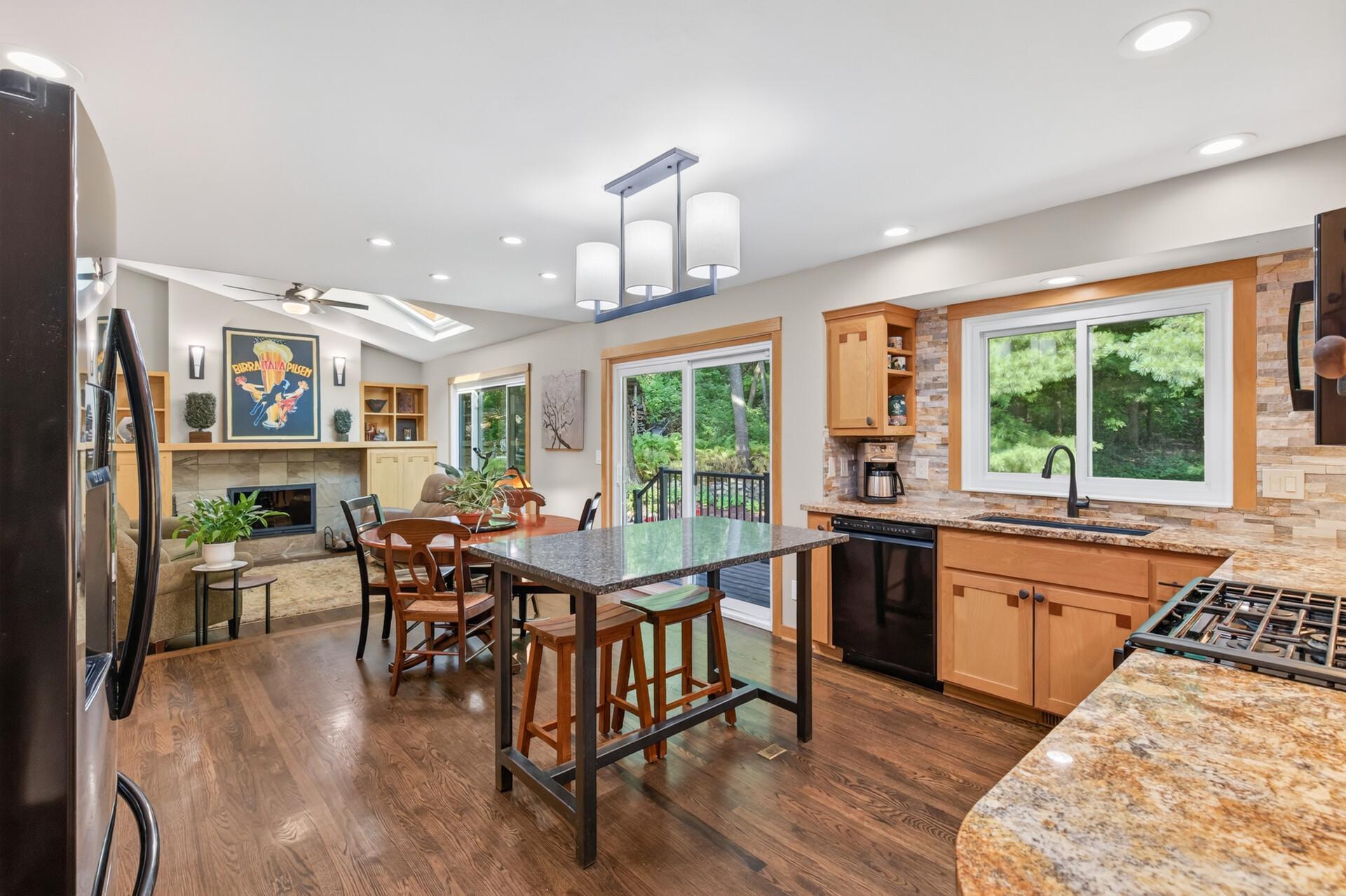 An open kitchen and dining area designed for everyday meals, casual conversation, and effortless entertaining.