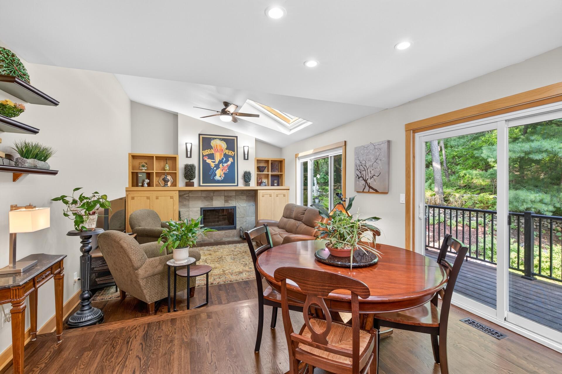 Gather around the fireplace or enjoy dinner surrounded by beautiful backyard views.