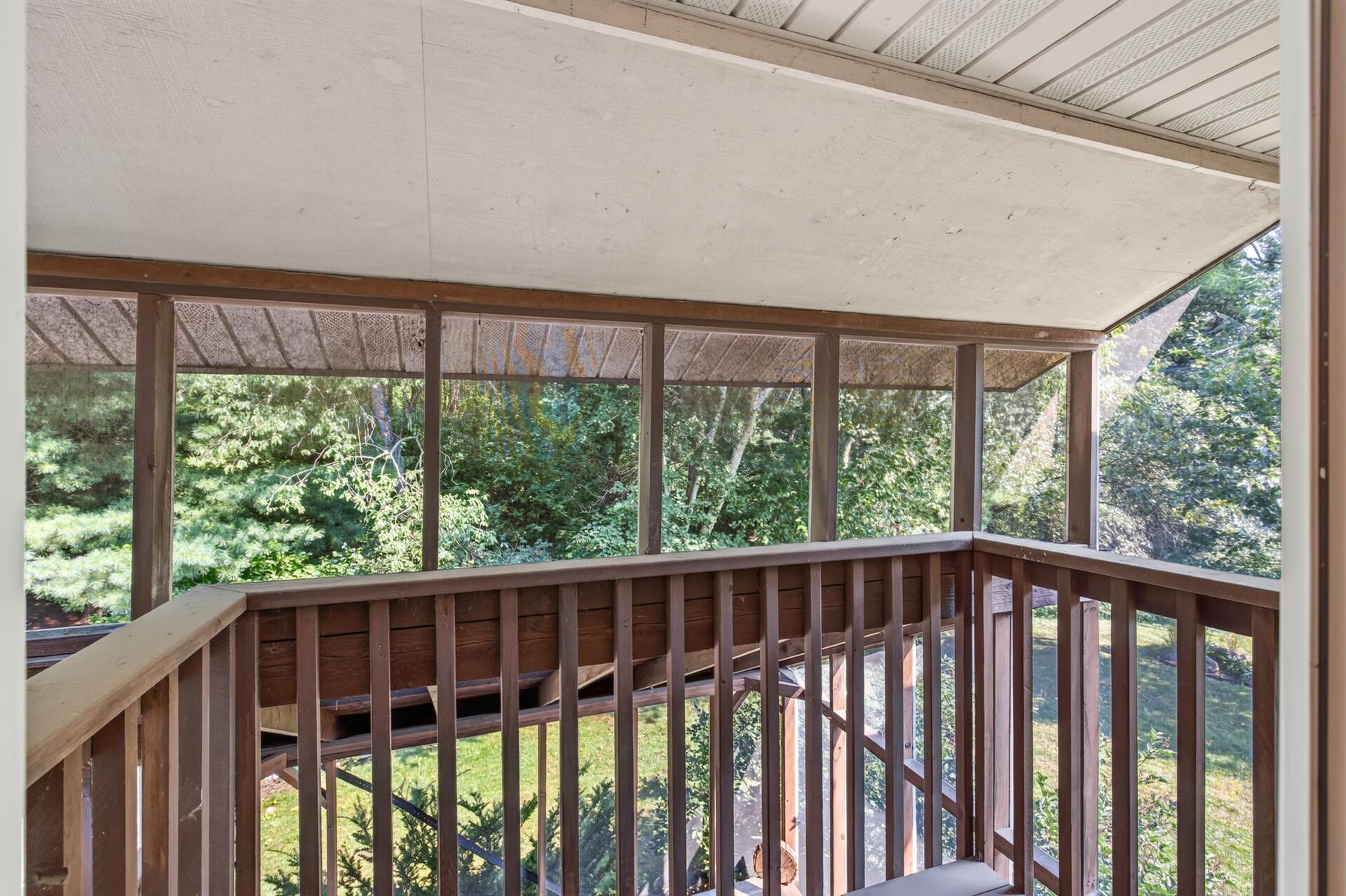 Begin the day with coffee or unwind in the evening on the primary suite’s private screened balcony.