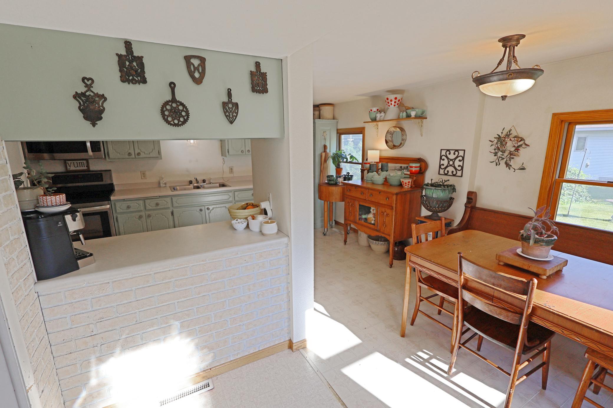 View from the back entry to the kitchen and dining.