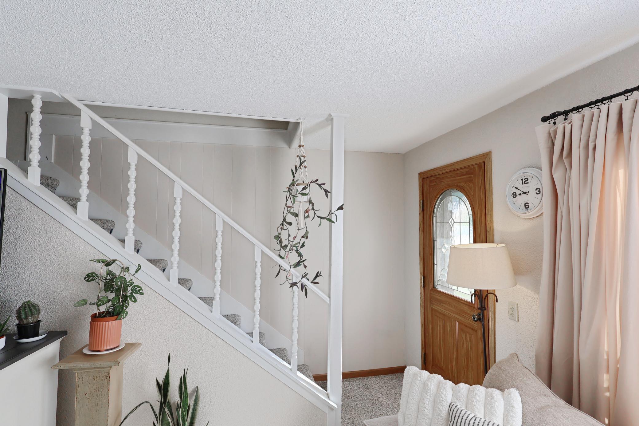 Inviting front entry with stained glass.