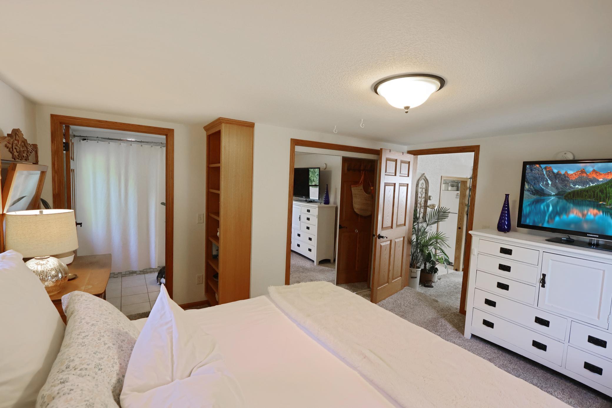 Main floor primary bedroom with a walk-through bathroom.