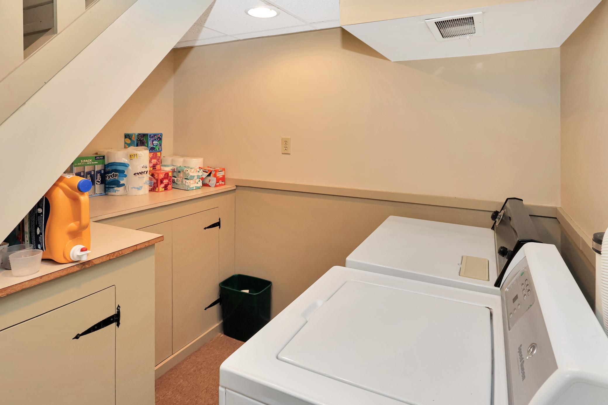 Lower level laundry area.