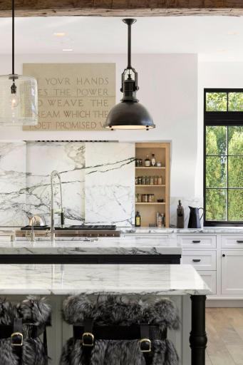 Marble sliding backsplash for spice storage