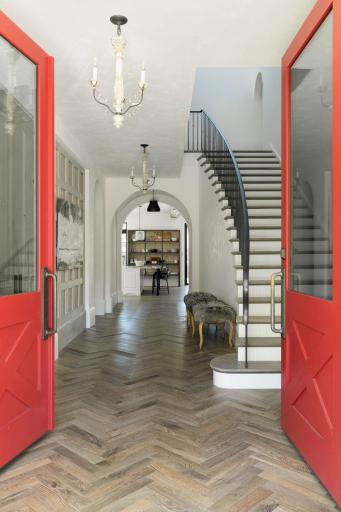 Gorgeous entry with French Oak Floors and Pecky Cyprus accents