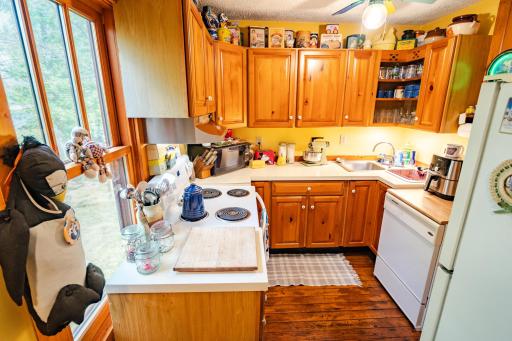 Kitchen with dishwasher and electric stove...