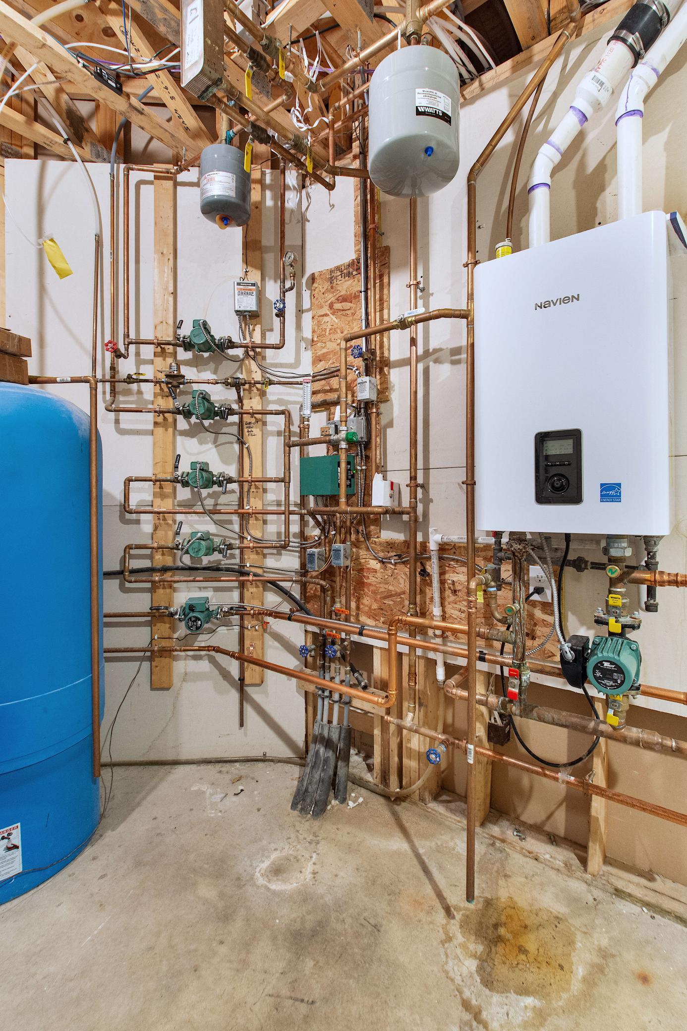 Floor Heat System - heats Basement, Garage and Primary Ensuite floors!