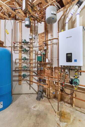 Floor Heat System - heats Basement, Garage and Primary Ensuite floors!