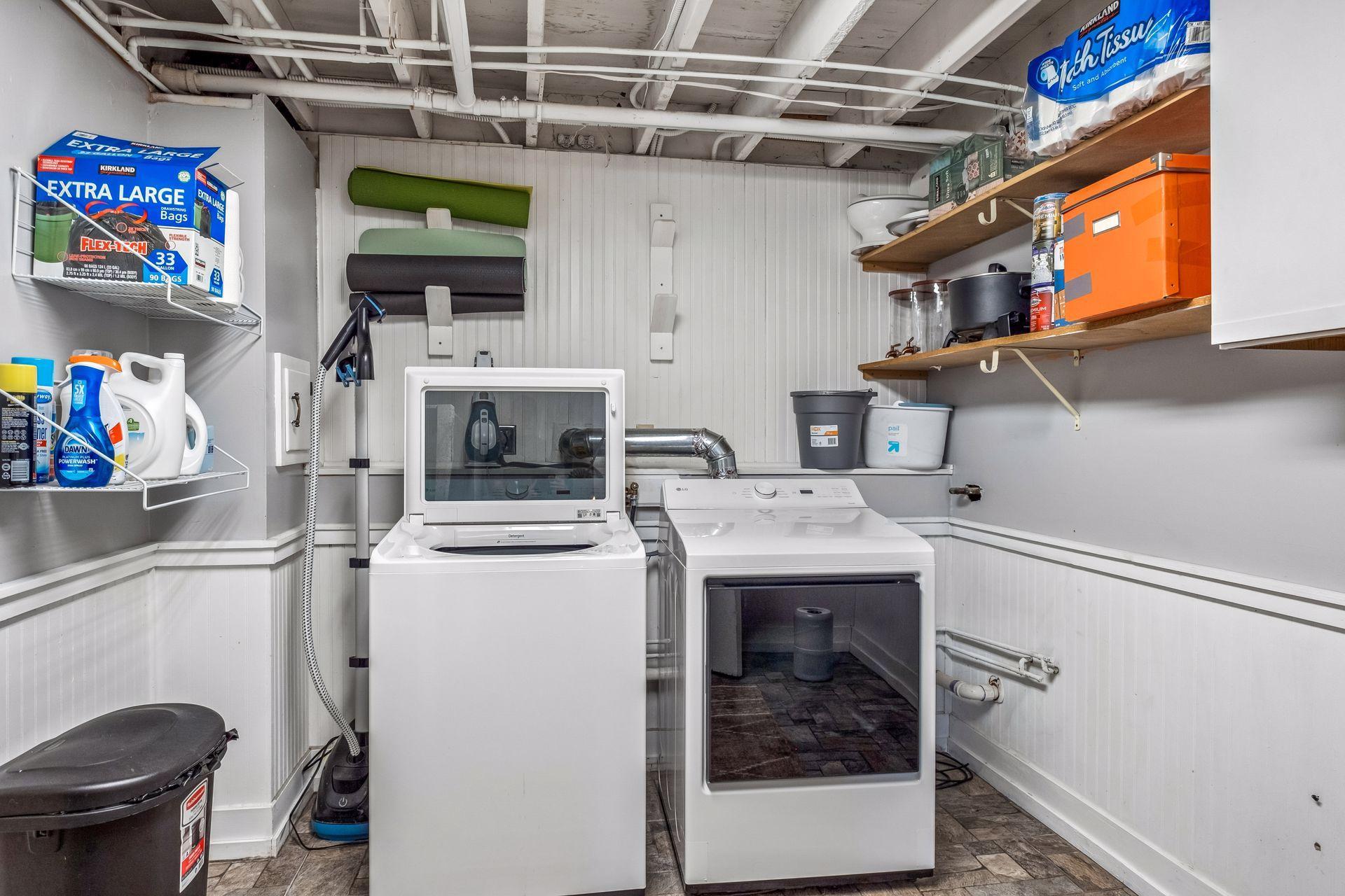 Lower level laundry room with new washer and dryer in 2025
