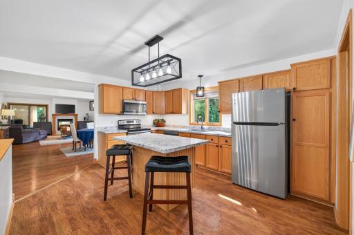 Updated kitchen is light filled and ample sized