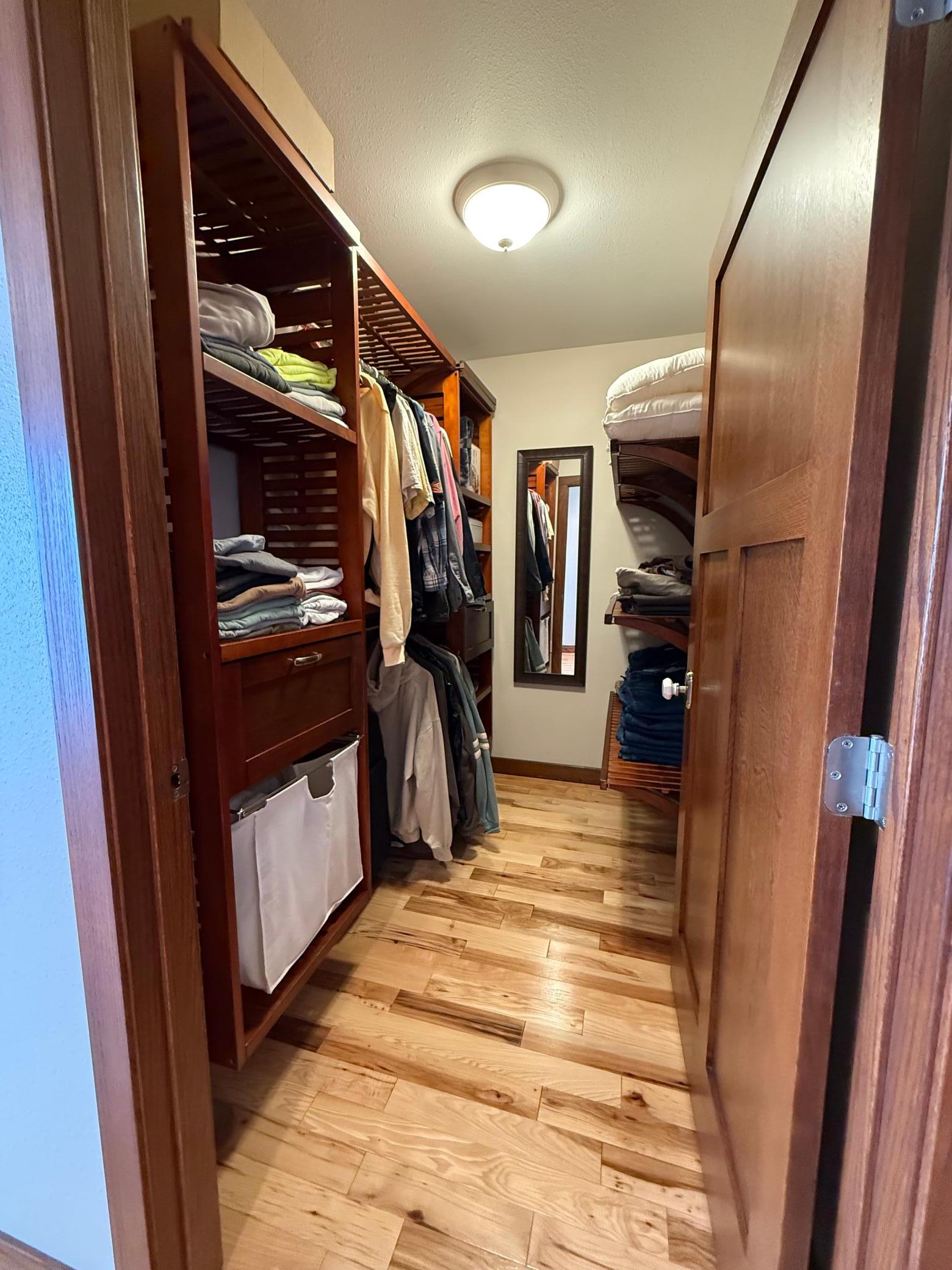 Building 1 upper level walk-in closet.jpg