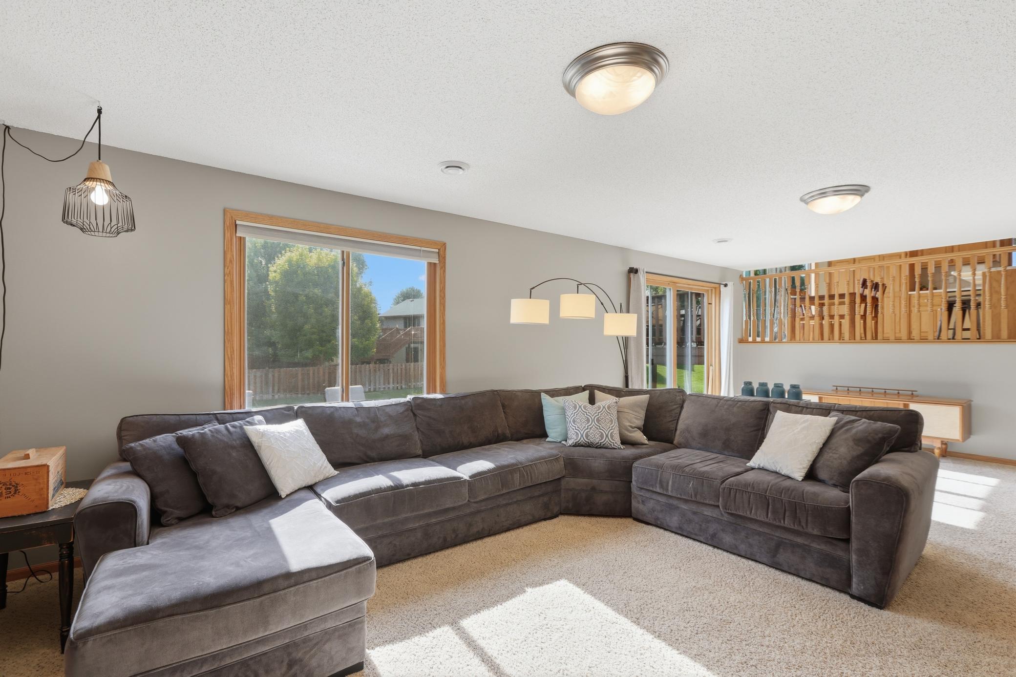 Comfortable Living Room with Abundant Natural Light and an Open Flow