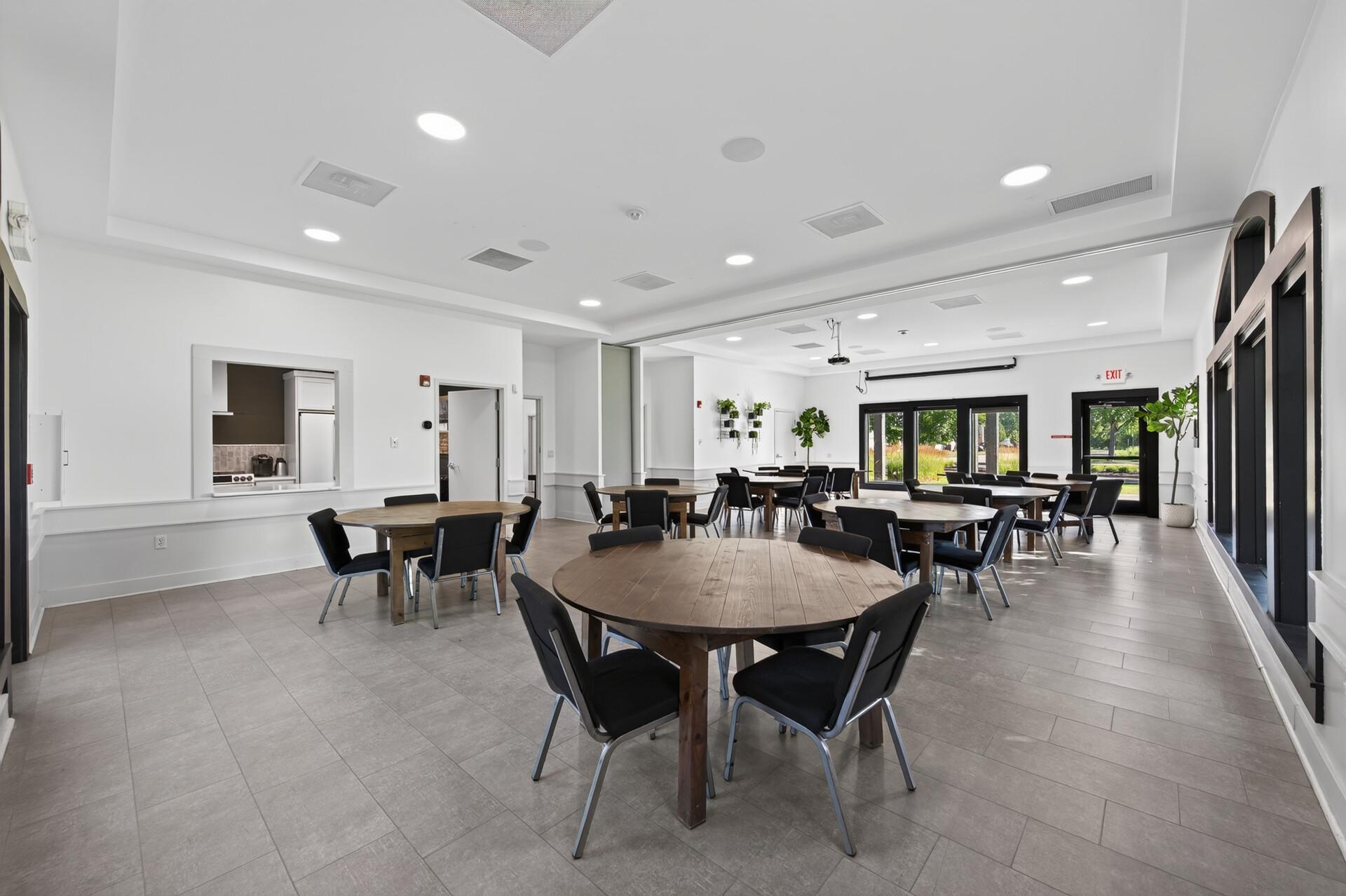 Community center room is perfect for showers, graduations or events. The kitchen opens to the area for easy delivery of treats.