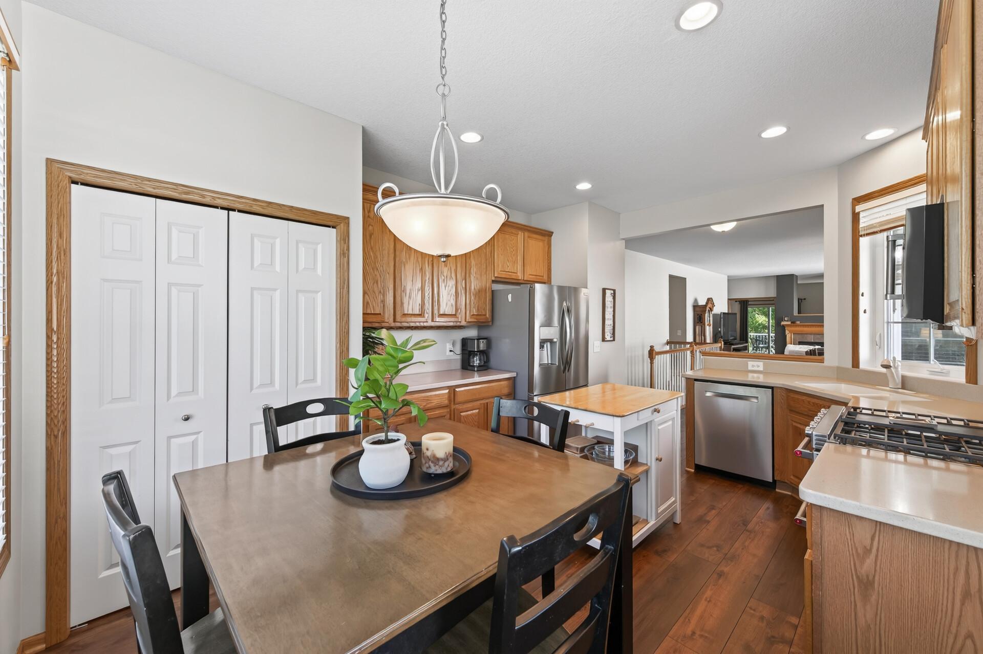 A large pantry and generous cabinetry throughout make this kitchen as organized as it is beautiful — plenty of room for everything you need and then some.