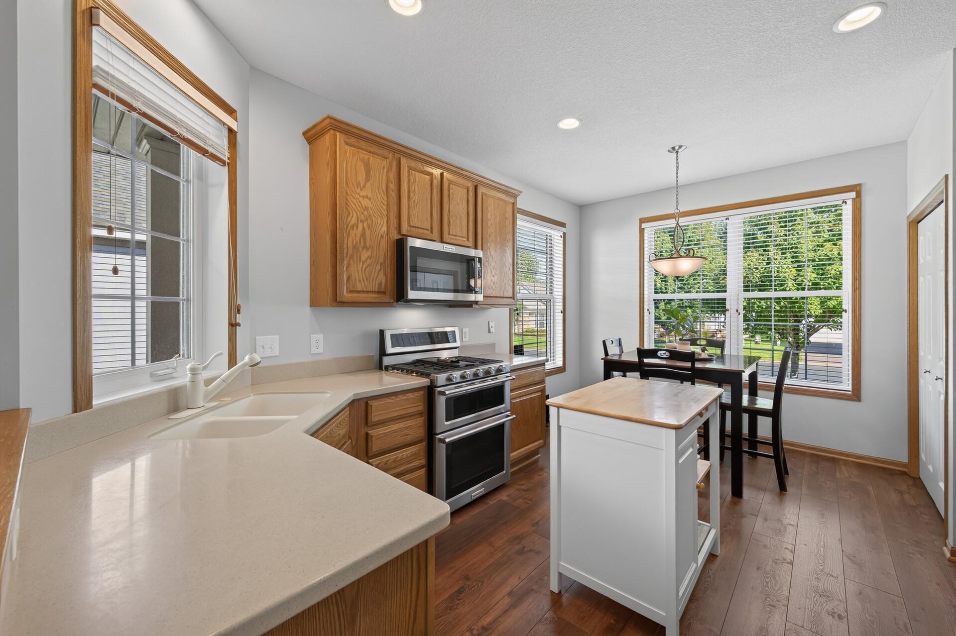 Newer appliances, generous countertops, a functional island, and a dining space right around the corner; this kitchen has everything you need right where you need it.