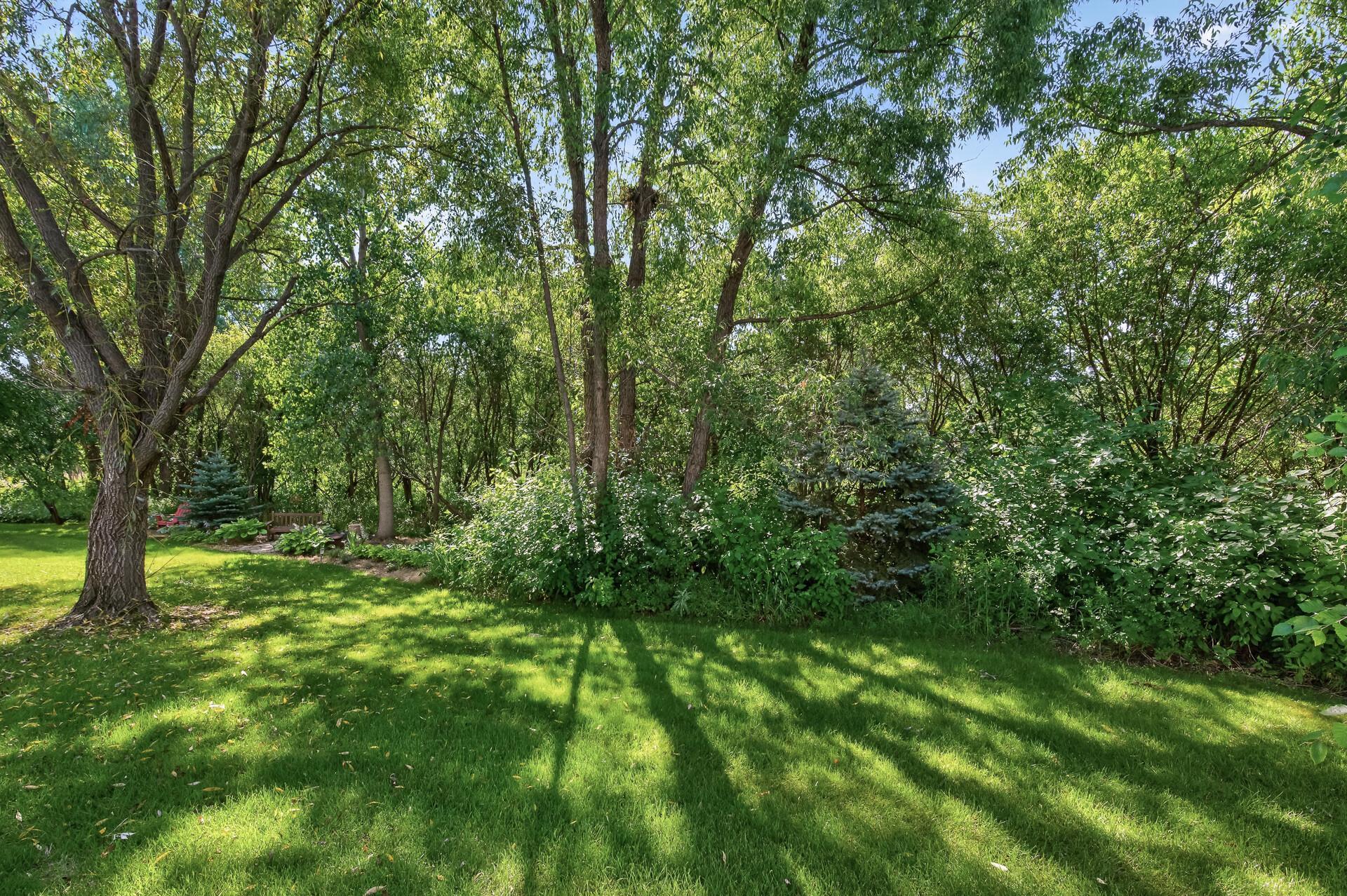 This is the backyard most villa buyers never think they can have — completely private, beautifully wooded, and with room for a garden too. A genuinely rare find at this price point.