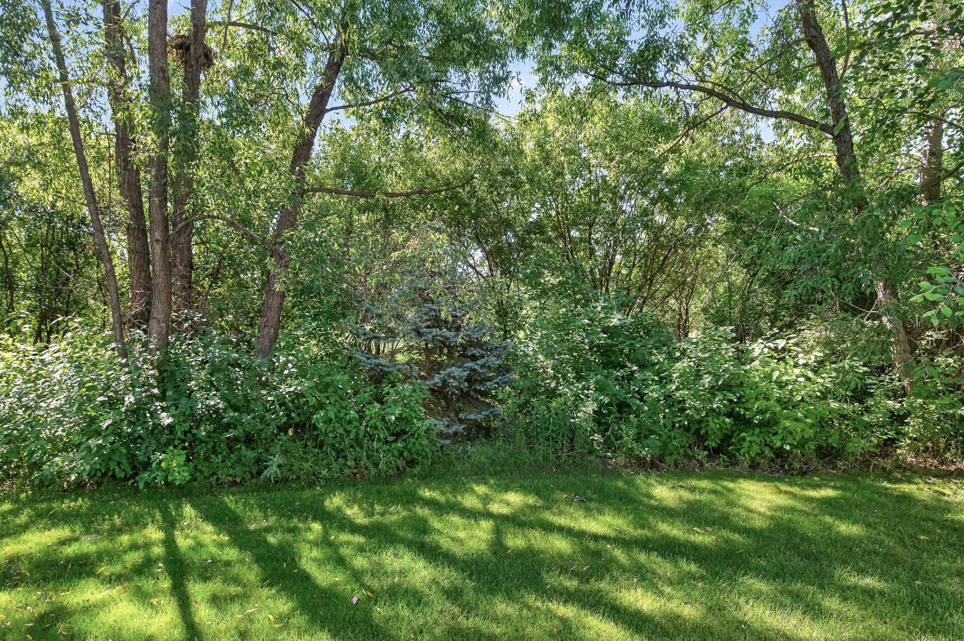 Step outside and breathe; this private backyard retreat is surrounded by nature and offers the kind of seclusion that is truly hard to find in villa living.